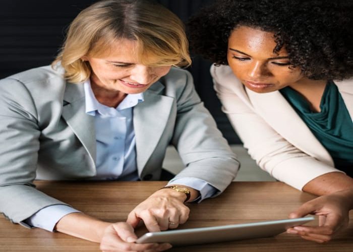 Businesswomen using a digital tablet